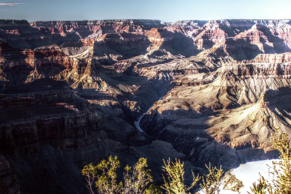 Colorado River winding through the canyon, seen on a Grand Canyon tour from Las Vegas, Grand Canyon, Arizona.