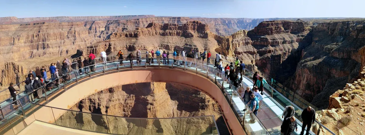 Visitors on the glass Skywalk platform, a stop on a Grand Canyon tour from Las Vegas, Grand Canyon West, Arizona.